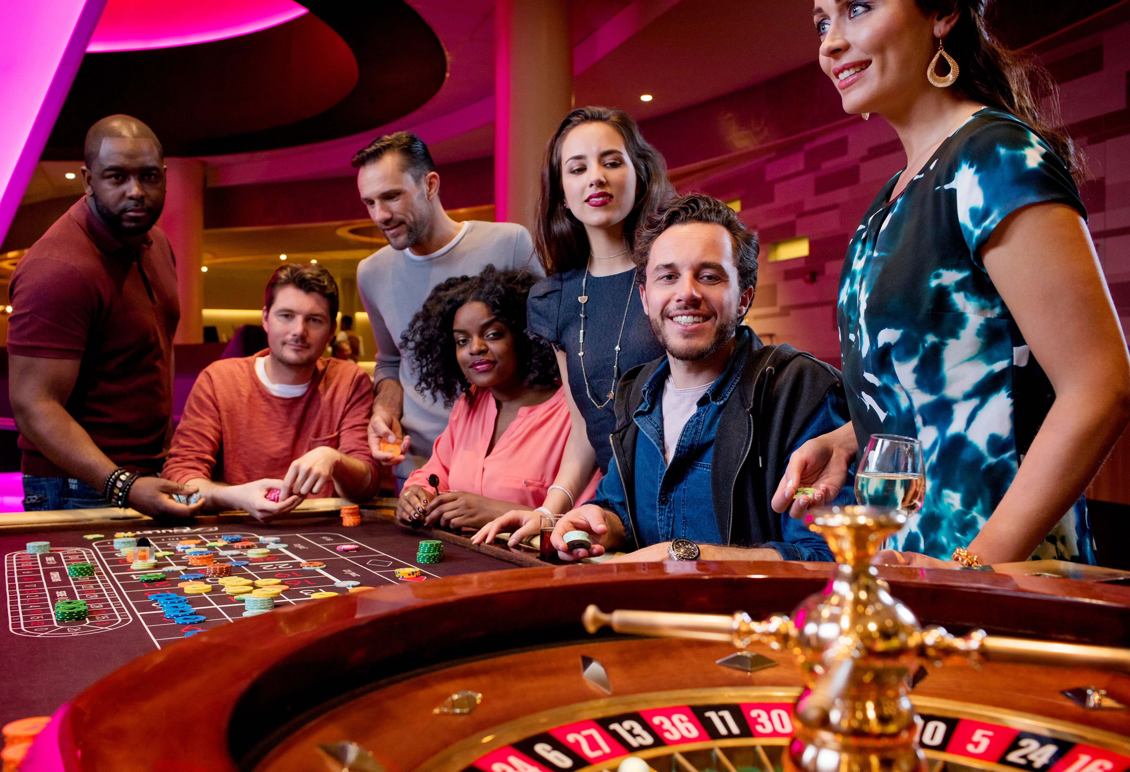 Holland Casino Seven people playing game in Casino