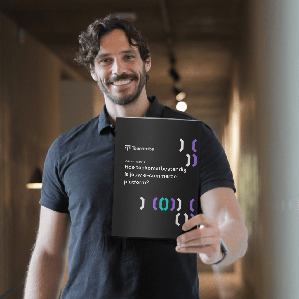 Erik, eCommerce Manager, holds a copy of the eCommerce Future Scan report Erik holding report of eCommerce Future Scan