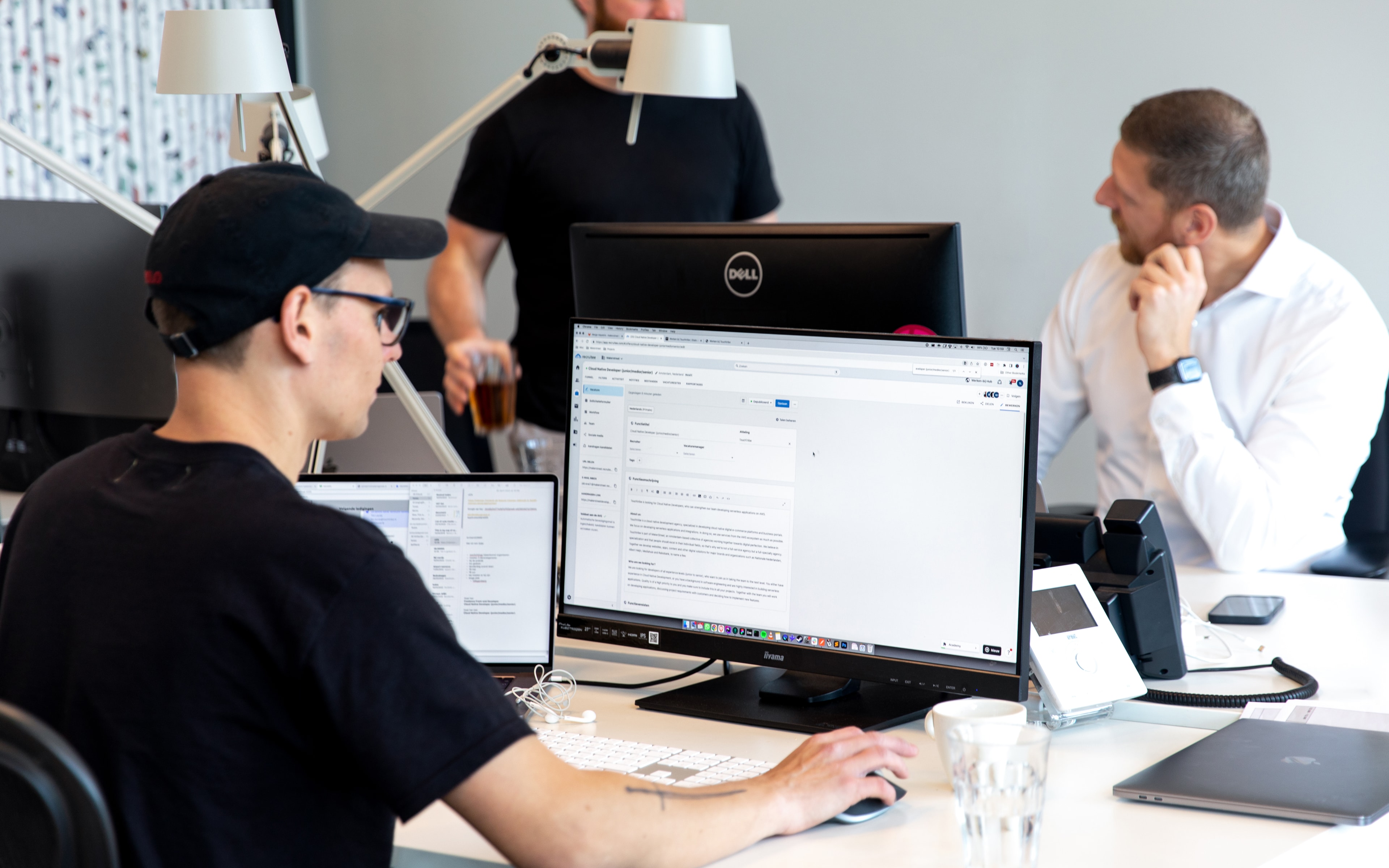 multi-lingual e-commerce Touchtribe colleagues working together at the office